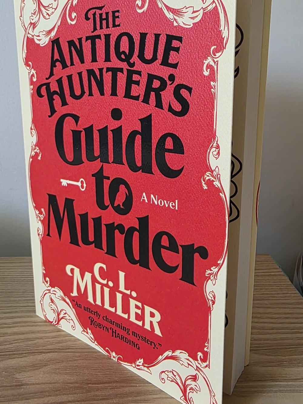 2 For $16 Books - The Antique Hunter's Guide to Murder by C. L. Miller